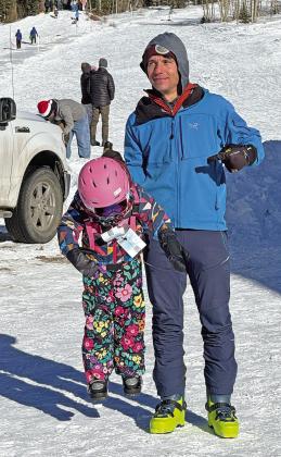 Adam and Ava Andrade after a long day skiing at Kendall Mountain Ski Area. Photo credit Katey Fetch