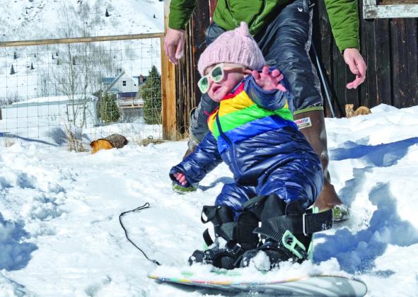 Photo credit Hannah Kurzweil Wilder Kurzweil hitting the powder on her new snowboard.