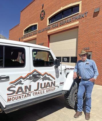 Photo by DeAnne Gallegos Mike Maxfield standing by his new Jeep.