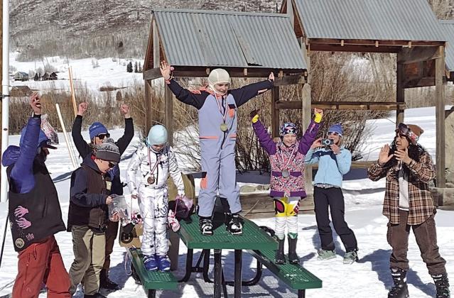 Celebrating a win at the Kendall Ski Races. Photo credit Monica Watton