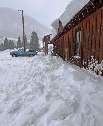 Photo credit Scott Fetchenhier Fallen snow off the Mining Heritage Museum roof, watch out for roof avalanches as they start to occur during warming periods.
