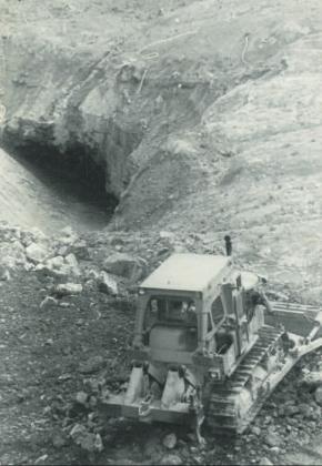 Photo Courtesy of San Juan Historical Society In this June 1978 file photo, bulldozer operator Andy Archuleta moves earth at what had only days earlier been Lake Emma. The lake drained into the Sunnyside Mine on June 4, 1978, 35 years ago this week. Above, the Sunnyside Mine complex at Lake Emma.