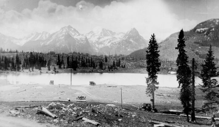 Molas Lake and surroundings around 1930, looking easterly into the Grenadier Range. Includes four automobiles. Very little development, and whatever improvements may have existed then must has been just out of the scene at the left. San Juan County Historical Society photo