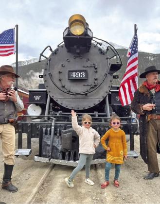 Willow Blankenship and Ava Andrade posing with the first train. Photo credit Sterling Blankenship