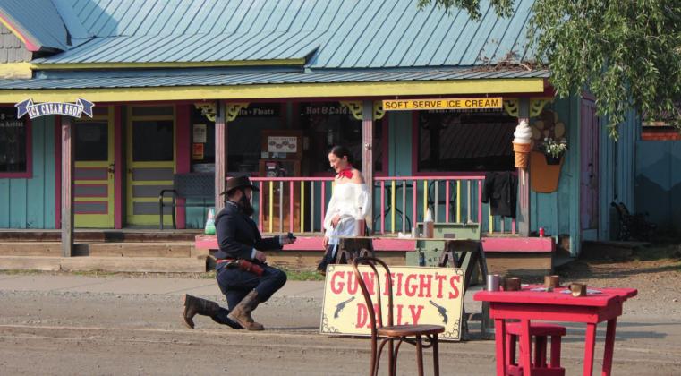 Corey Rasmussen (left) proposed to his longtime girlfriend during one of the Gunfights. She thought they were standing in for actors who couldn’t be there but instead got the surprise of a lifetime. She said yes. Photo Credit Jennifer Smith
